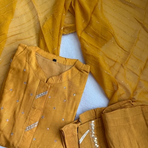 Yellow dola silk mirror work kurti set