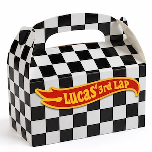 May include: A rectangular cardboard favor box with a black and white checkered pattern. The box features a top handle and a red, flame-shaped graphic on the front with yellow text that reads Lucas' 3rd Lap in a stylized racing font.