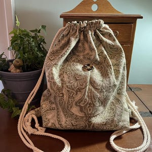 Mochila com cordão para trabalho, escola e lazer - Tamanho médio