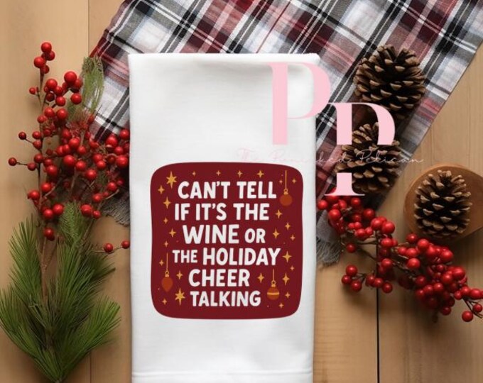 Can't tell if its the wine or holiday cheer towel