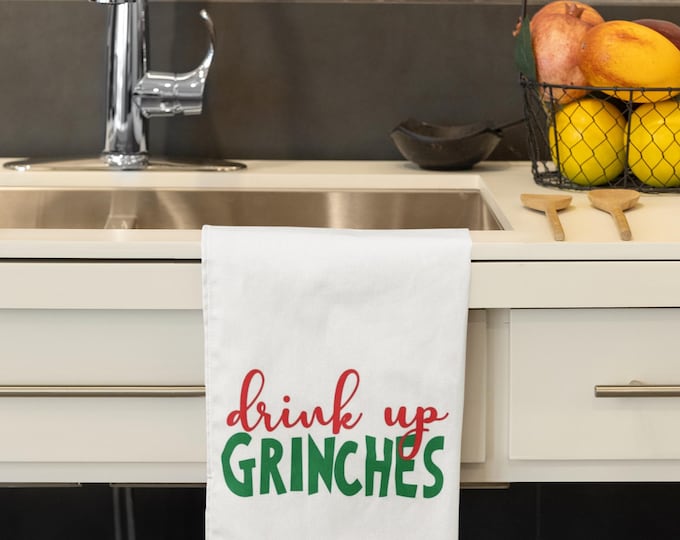 drink up grinches tea towel