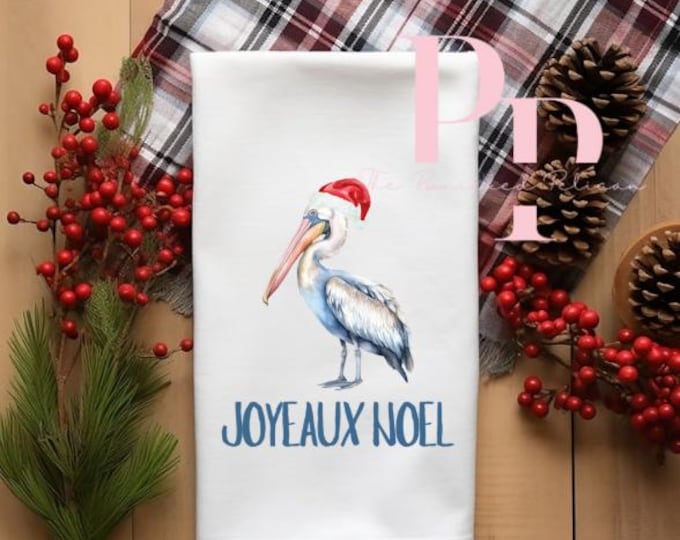Joyeaux Noel Pelican tea towel