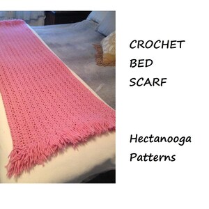 May include: A pink crocheted bed scarf with fringe. CROCHET BED SCARF Hectanooga Patterns.