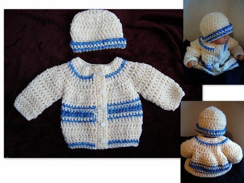 May include: A cream-colored, crocheted baby sweater and matching hat set. The sweater has long sleeves, a button-up front, and blue trim along the collar, cuffs, and pockets. The hat has a blue band. The set is handmade.