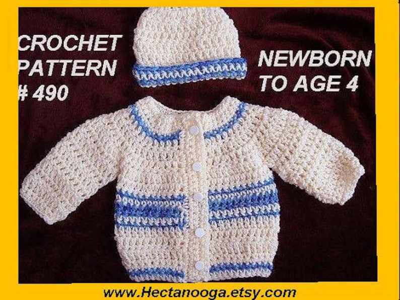 May include: A cream-colored crochet baby sweater and matching hat with blue trim. The sweater has a button-up front and blue stripes. Text on the image reads "CROCHET PATTERN #490" and "NEWBORN TO AGE 4".