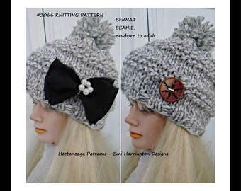 May include: A gray knitted beanie with a black bow and a white pom-pom on top. The beanie is made with Bernat yarn and is suitable for newborns to adults. The knitting pattern is #2066.