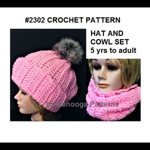 May include: A pink crochet hat with a gray faux fur pom-pom and a matching cowl set. The text reads "#2302 CROCHET PATTERN HAT AND COWL SET 5 yrs to adult". The hat and cowl are displayed on a mannequin.