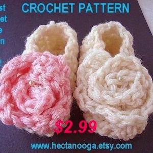 May include: Two handmade crochet baby booties. One is light pink with a rose design, and the other is off-white. The text at the top says "CROCHET PATTERN". The text on the left says "Easiest crochet bootie pattern in the world!"