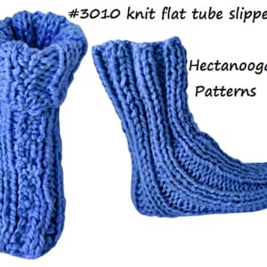 May include: A pair of blue knitted slipper socks. The socks are made with a cable knit pattern. The socks are shown in two views, one with the top of the sock and the other with the bottom of the sock. The text #3010 knit flat tube slipper and Hectanooga Patterns is visible in the image.