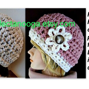 May include: Two crocheted hats, one white with a button and one pink and white with a flower and button. The text "www.hectanooga.etsy.com" is visible in the image. The text "For this FREE crochet pattern find the LINK in the description." is also visible in the image.
