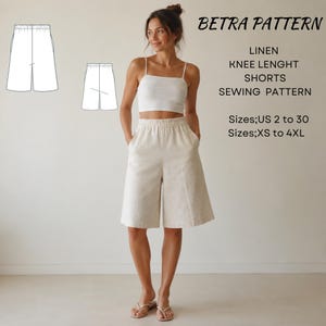 May include: A sewing pattern for knee-length linen shorts titled BETRA PATTERN. The image displays a white tank top and off-white shorts with an elastic waistband, alongside a technical line drawing of the shorts and text listing sizes US 2 to 30 and XS to 4XL.