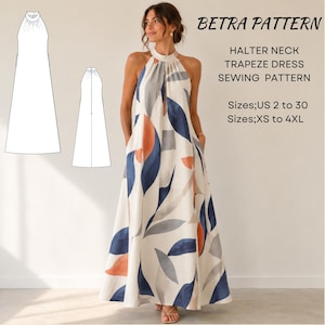 Peut inclure: Une robe trapèze longue jusqu'au sol avec un col licou, sur fond blanc avec un motif de feuilles bleues, grises et orange. Texte : BETRA PATTERN, HALTER NECK TRAPEZE DRESS SEWING PATTERN, Sizes; US 2 to 30, Sizes; XS to 4XL. Inclut deux croquis.