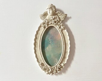 Oval Pastel Painting in Floral and Cherub Decorated Frame, Small Oil on Canvas