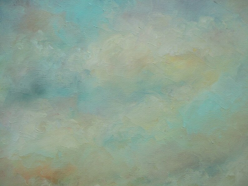 Puede incluir: Pintura abstracta sobre lienzo, que presenta una mezcla de tonos suaves. La obra de arte presenta azul claro, amarillo p&aacute;lido y sutiles tonos marrones. Las pinceladas crean un efecto nublado y et&eacute;reo, evocando una sensaci&oacute;n de calma y serenidad.