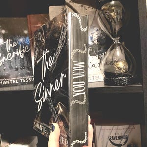 The sinner by Shantel tessier with custom hand painted edges