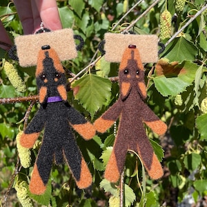 Doberman and bite pillow hanger