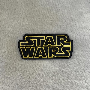 Star Wars Logo Patch | 3.5 x 1.25 Inch Embroidered Iron-On | Classic Yellow & Black Design