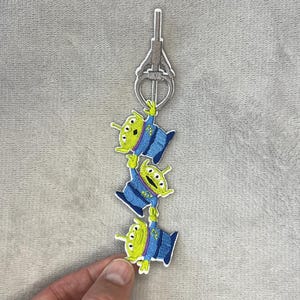 Parche bordado termoadhesivo de Toy Story: Alienígenas Verdes y La Garra
