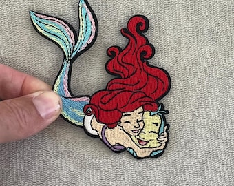 Ariel Hugging Flounder Patch | 3.25x3.5 Inch Embroidered Iron-On | Iridescent Disney Mermaid