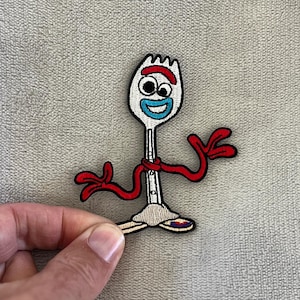 Gaffeltygmärke | Broderat 7,5x6,5 cm strykbart | Toy Story Pixar-tygmärke