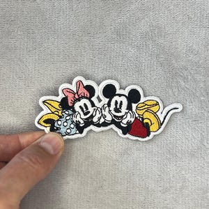 Toppa vintage ricamata termoadesiva di Topolino e Minnie.