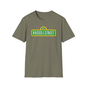 Raised by the Street Public Broadcasting T-Shirt — Support Sesame Street 90s Kids Tee Heather Military Green
