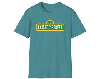 Raised by the Street Public Broadcasting T-shirt — Support Sesame