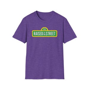 Raised by the Street Public Broadcasting T-Shirt — Support Sesame Street 90s Kids Tee Heather Purple