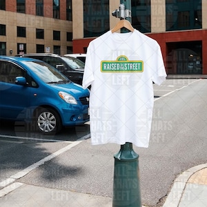 Raised by the Street Public Broadcasting T-Shirt — Support Sesame Street 90s Kids Tee White
