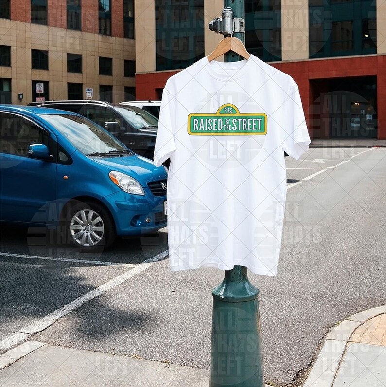 Raised by the Street Public Broadcasting T-Shirt — Support Sesame Street 90s Kids Tee White