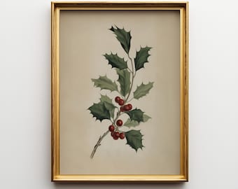 May include: A framed botanical print featuring a holly branch with green leaves and red berries. The artwork is set against a neutral background and framed in a gold-colored frame. The print has a vintage aesthetic.