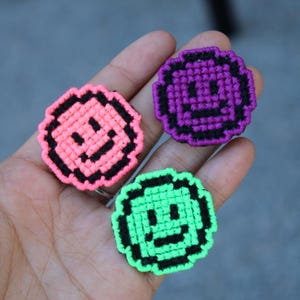 Smiley pin