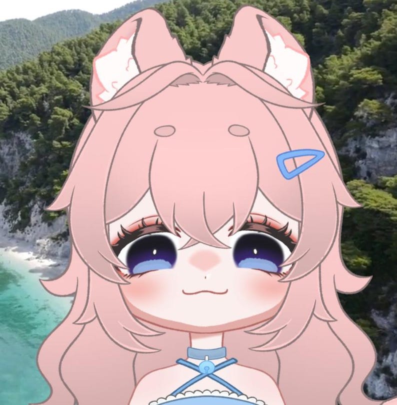 May include: A digital illustration of a cartoon character with pink hair and cat ears. The character has large blue eyes, a small mouth, and a blue hair clip. The background shows a beach and mountains.