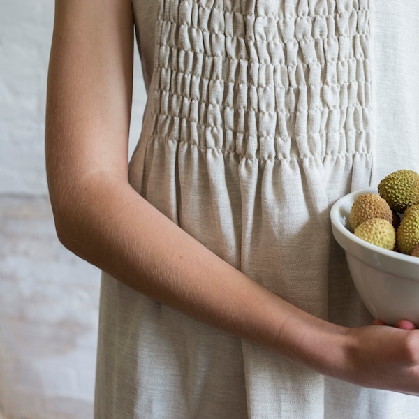 smocked apron in oatmeal linen