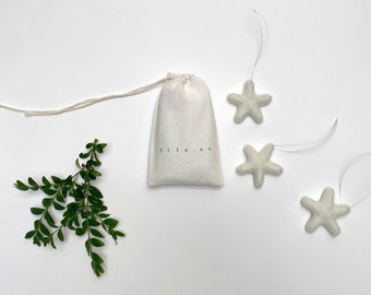 set of 3 felted wool stars (in cotton bag)