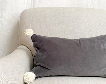 velvet pillow with pom poms- grey