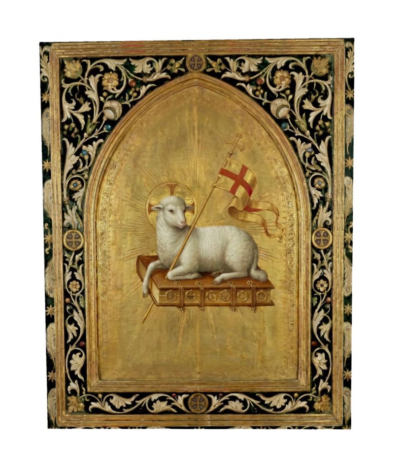 May include: A religious painting featuring a white lamb with a halo, holding a flag with a red cross, resting on a book. The artwork is set against a gold background within a decorative frame with floral and geometric patterns.