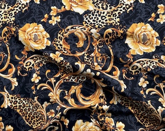 Puede incluir: Tela negra con estampado de leopardo dorado y marrón, patrón floral dorado y volutas doradas de estilo barroco.
