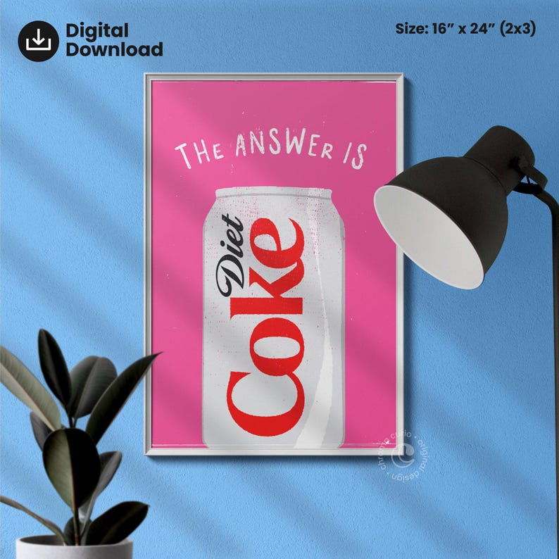 May include: A pink poster with the text "The answer is" and a white can of Diet Coke. The can is centered on the poster and the text is above the can.