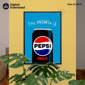 Peut inclure: Affiche numérique encadrée avec un design de canette Pepsi Max. La canette noire porte le logo Pepsi en rouge, blanc et bleu. Les mots "THE ANSWER IS" sont au-dessus de la canette, et "MAX" en dessous. L'affiche est sur un mur jaune.