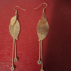 Gold Bejeweled Feather Earrings