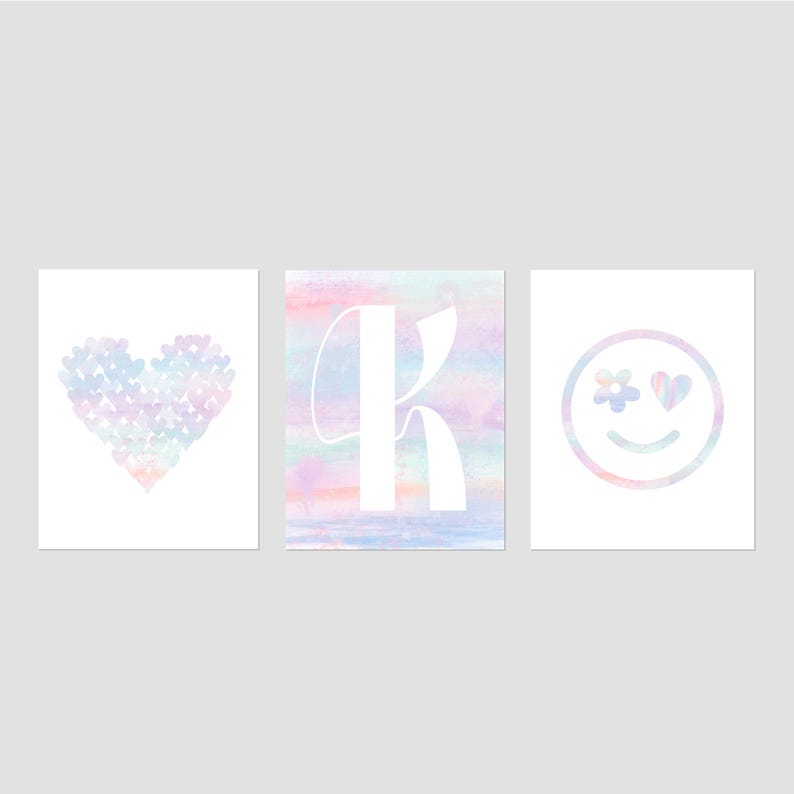 May include: Three pastel-colored illustrations: a heart made of smaller hearts, the letter K, and a smiley face with flower and heart eyes.