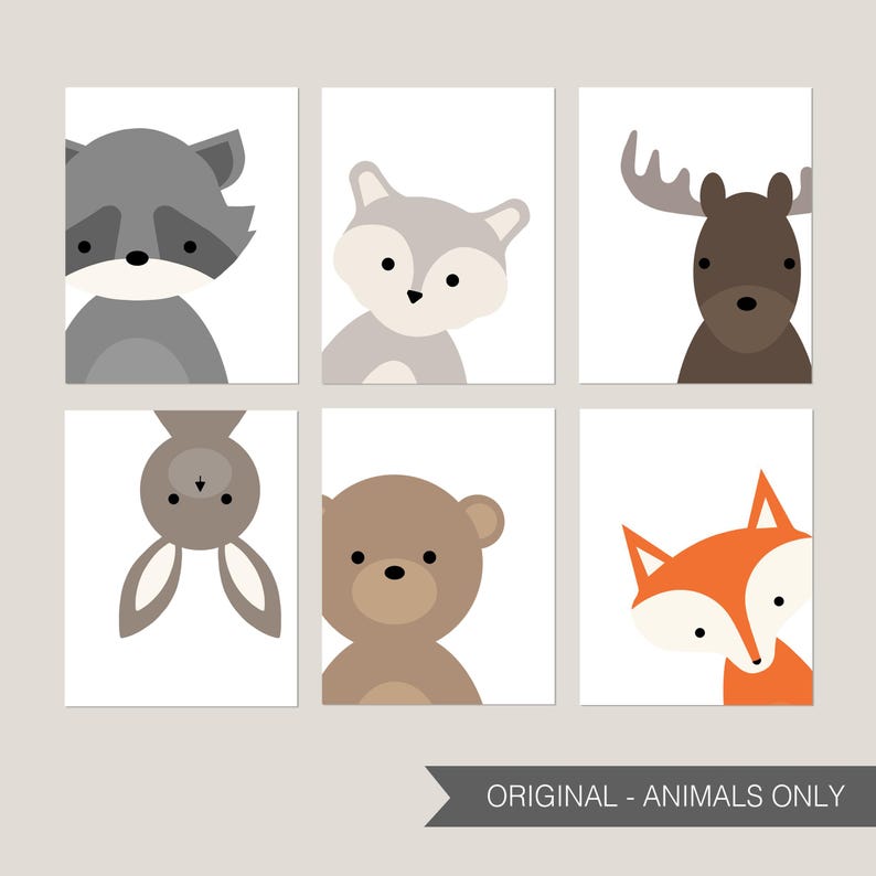 May include: Set of six printable nursery art prints featuring cute cartoon animals. The animals include a raccoon, fox, moose, bunny, bear, and fox. The prints are in a minimalist style with white backgrounds and simple outlines.