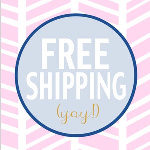 May include: A blue circle with a white background and the text "FREE SHIPPING (yay!)" in white and gold lettering. The circle is on a pink and white chevron pattern background.