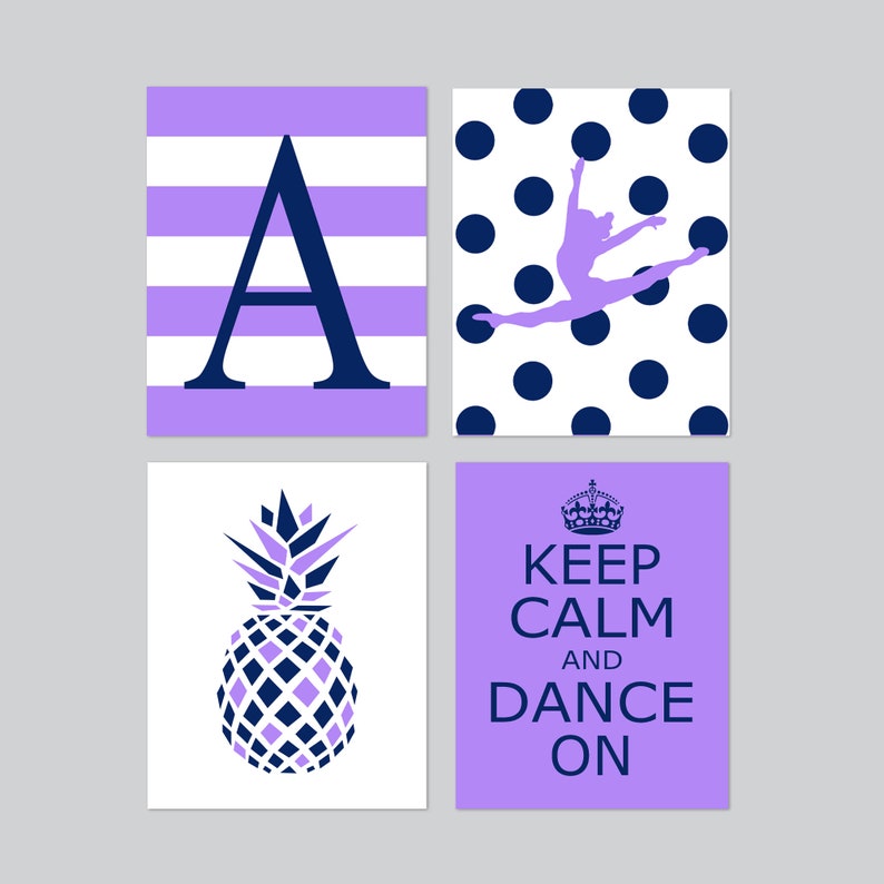 May include: Four printable wall art prints with a purple and white color scheme. The first print features the letter A in a navy blue color on a purple and white striped background. The second print features a silhouette of a dancer in a purple color on a white background with navy blue polka dots. The third print features a pineapple with a navy blue and purple geometric pattern. The fourth print features the text "Keep Calm and Dance On" in navy blue on a purple background.