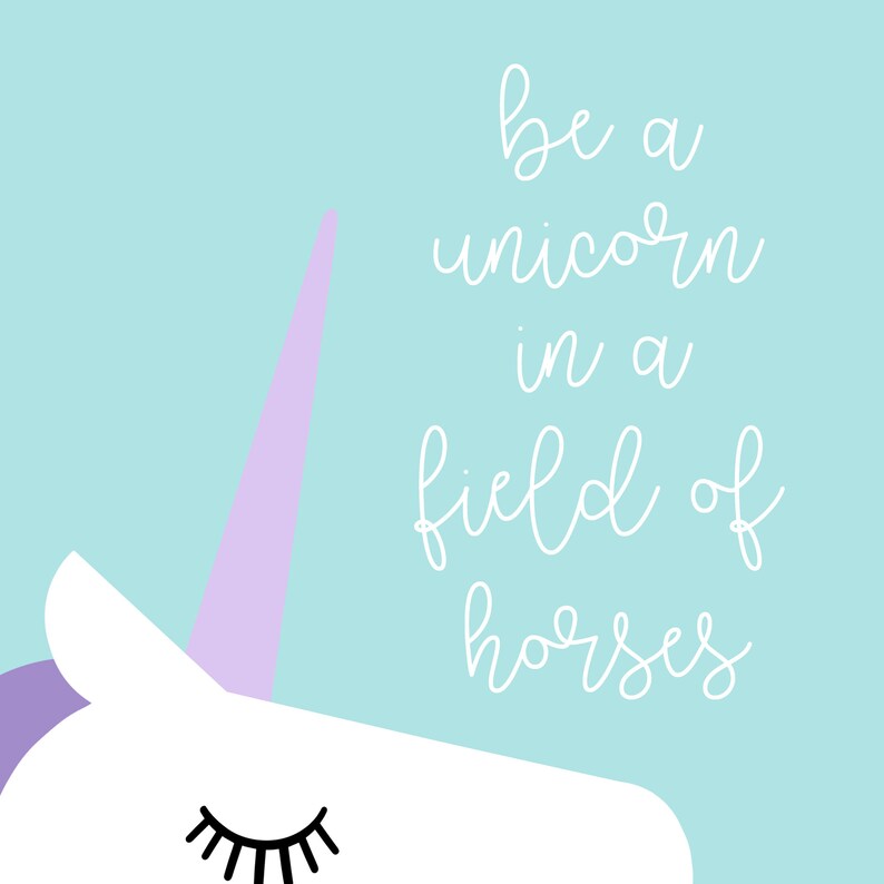 May include: A whimsical illustration featuring a white unicorn with a lavender horn and closed eyes, set against a light blue background. The text "be a unicorn in a field of horses" is written in white cursive.