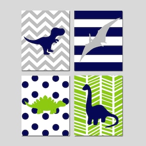 May include: Set of four printable dinosaur nursery art prints. Each print features a different dinosaur silhouette on a unique background pattern. The patterns include gray and white chevron, navy and white stripes, white with navy polka dots, and green and white chevron.