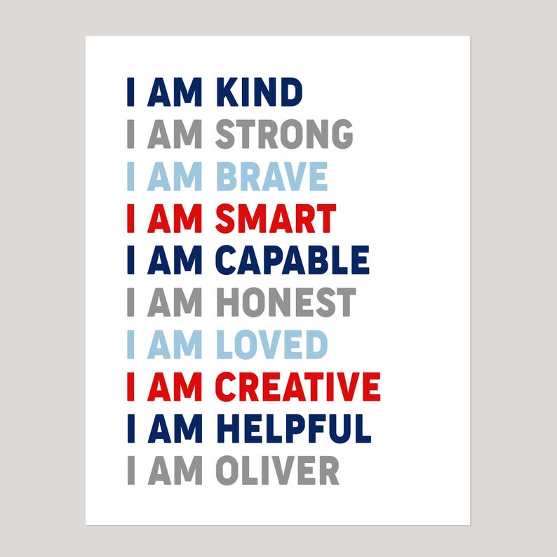 May include: A white background with blue, red, and gray text that reads "I am kind, I am strong, I am brave, I am smart, I am capable, I am honest, I am loved, I am creative, I am helpful, I am Oliver."