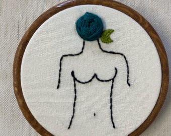 Woman's torso bust with blue rose for head 4” hanging embroidery