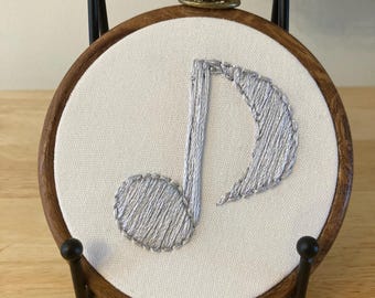 Silver eighth note music note hanging embroidery 4”